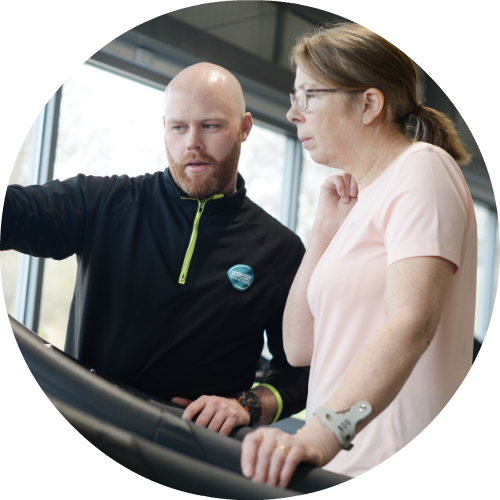 Round image person being shown to use a treadmill